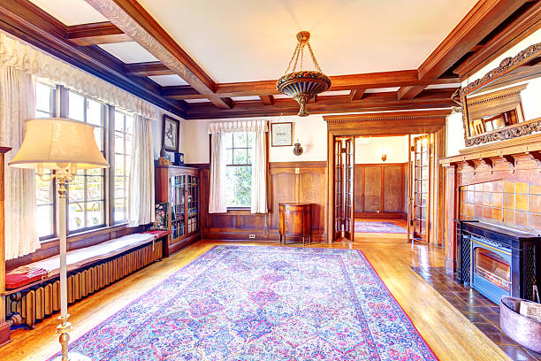 istock Empty office room with coffered ceiling, fireplace and cabinet 506153029