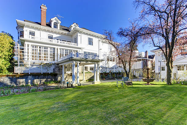 istock Luxury house with backyard garden 506156581