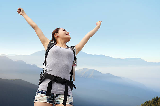 istock happy woman mountain hiker 506157967