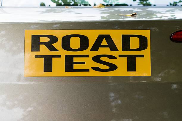 istock Road test sign with black letters against yellow background 506158289