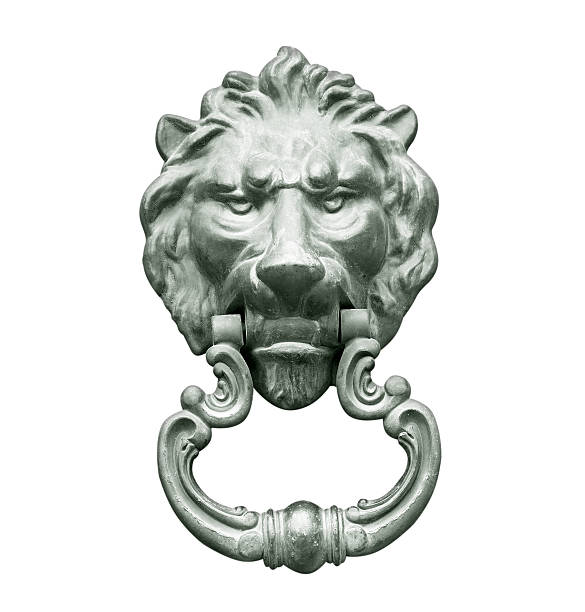istock Old lion head, Door knocker, isolated on white 506158525