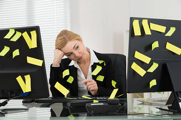 istock Businesswoman With Adhesive Notes In Office 506159488