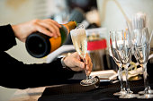 Waiter holding champagne