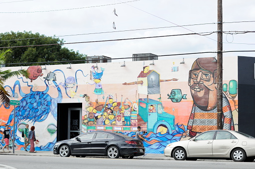 Miami, USA - January 21, 2016: Stock image of Art Walls at Wynwood which is a neighborhood north of Downtown Miami distinguished by it's artistic murals on all the building walls.