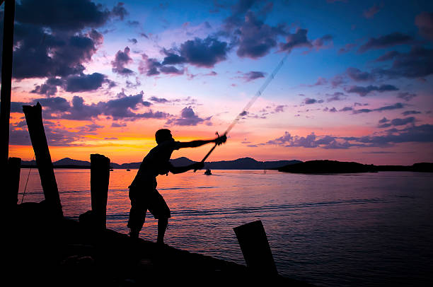 istock Man fishing , a marina , Thailan 506162616