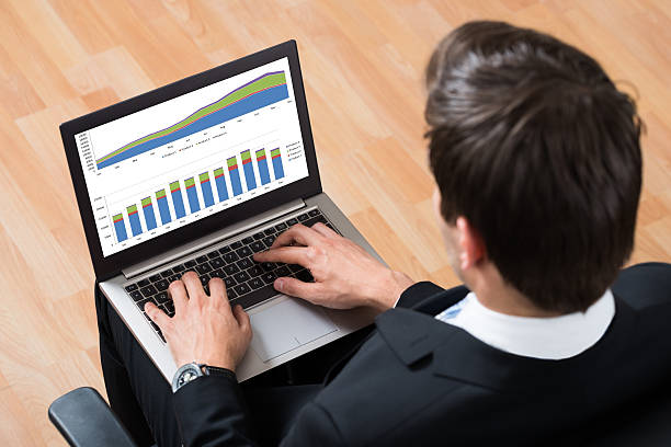 istock Businessman Checking Financial Report On Laptop 506162904