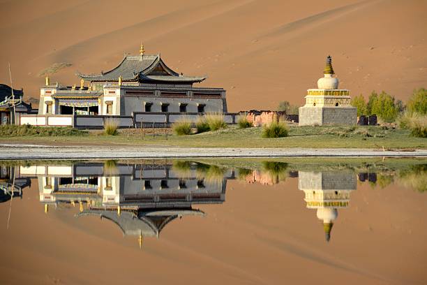istock Badain Jaran Temple, reflecting on its lake, Inner Mongolia 506165820