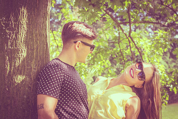 istock Smiling couple in park 506166424