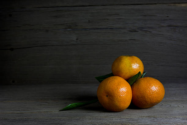 istock group oranges on wood background,still life 506169262