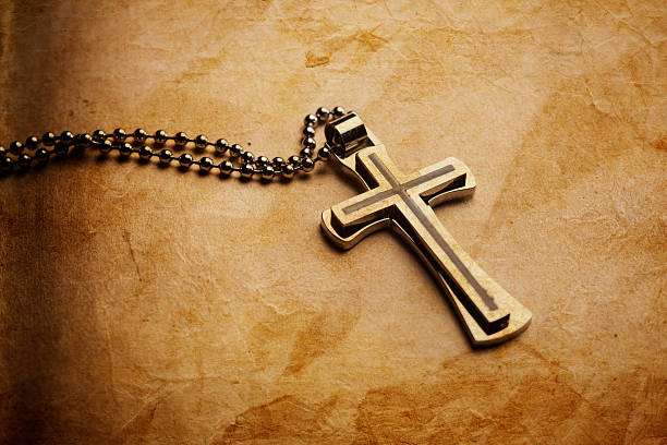 istock Closeup of silver Christian cross 506173066