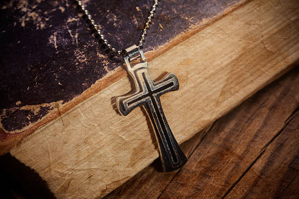 istock Closeup of silver Christian cross 506173704
