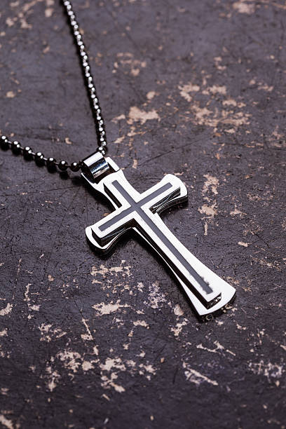 istock Closeup of silver Christian cross 506173910
