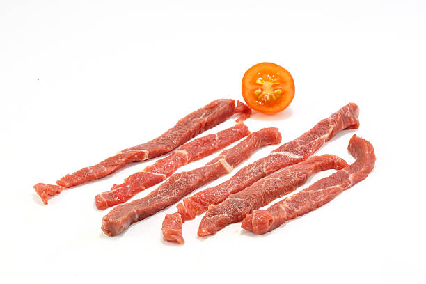 Raw beef strips stock photo