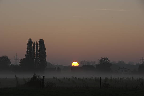 istock Misty sunrise over the country 506177726