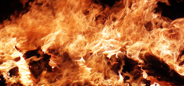 istock Looking At Background Of Burning Fire Flame In The Night 506178668
