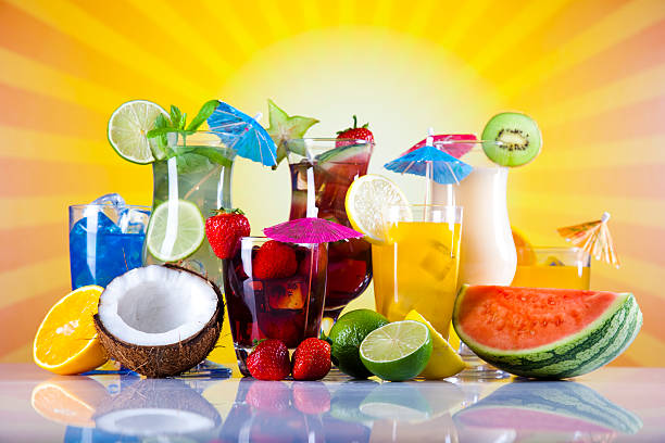 Tropical drinks on beach and sun