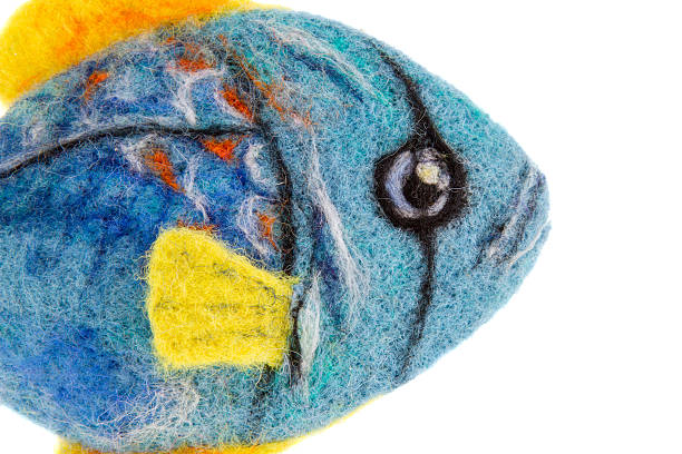 istock beautiful blue aquarium fish made of wool 506189625