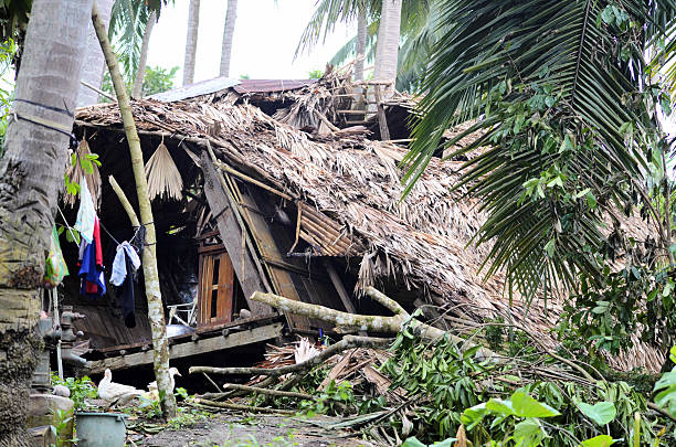 House Destroyed by Typhoon Photograph image of house totally destroyed by a supertyphoon Rammasun that struck the Philippines on July 16, 2014. 2004 indian ocean earthquake and tsunami stock pictures, royalty-free photos & images