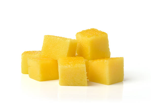 istock slice of fresh mango isolated on white background 506191413