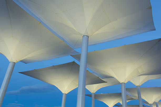 Large umbrellas in the car park at the Quays, Youghal Co. Cork, Ireland.