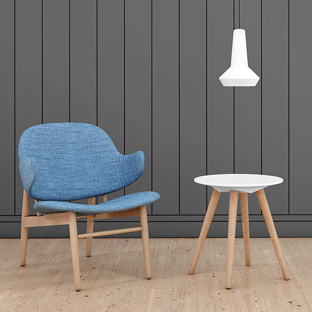 istock Blue armchair in front of a gray wall 506195124