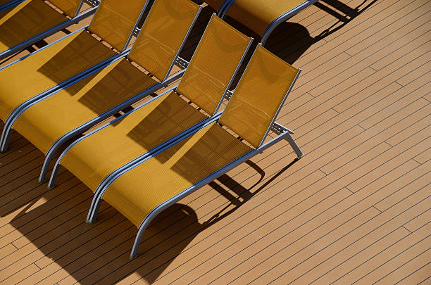 istock yellow sun loungers on cruise ship 506195946