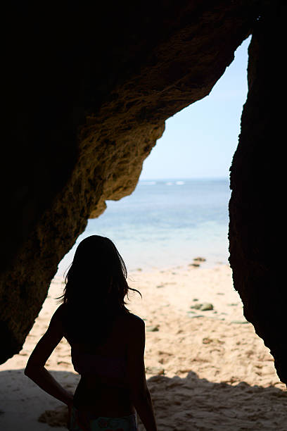 istock Young woman watching the ocean 506197132