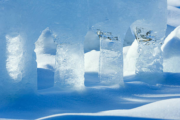 istock Transparent columns of ice on the snow 506198234