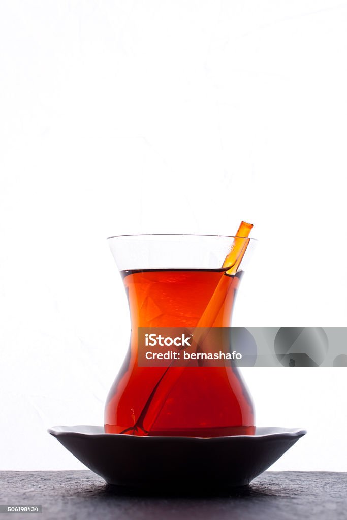 Black tea A Turkish tea glass of black tea Back Lit Stock Photo