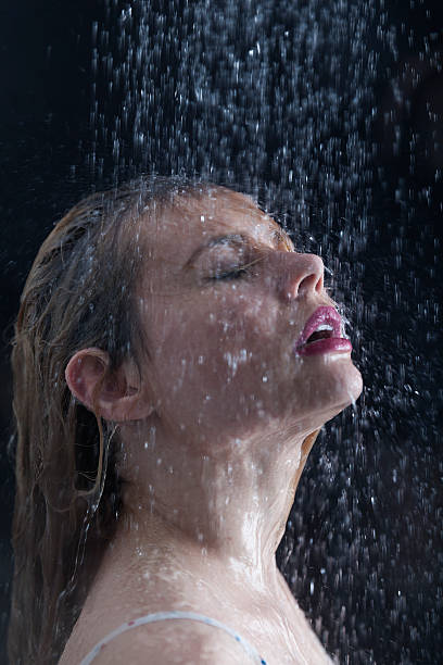 istock Sexy blonde taking shower 506199978