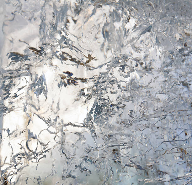 istock Glacial transparent block of ice with patterns. 506200274