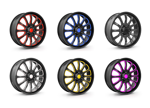 Alloy wheel isolated against black background