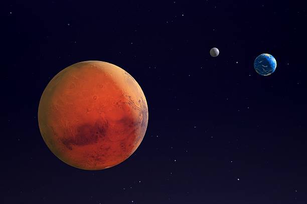 Mars, Earth and the Moon. Mars, Earth and the Moon in space - 3d render - elements of this image furnished by NASA. mars planet stock pictures, royalty-free photos & images