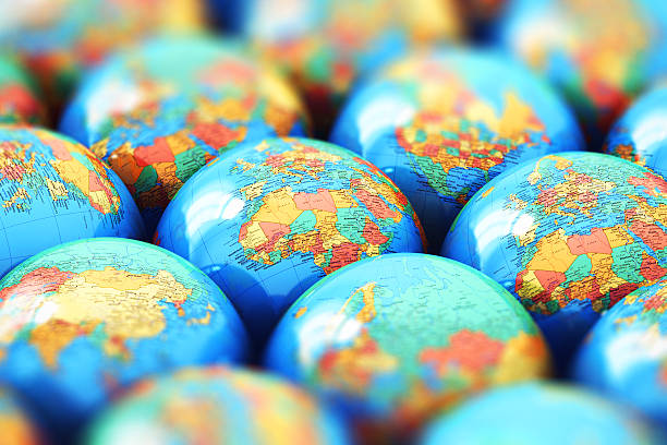 istock Small Earth globes with world maps 506202384