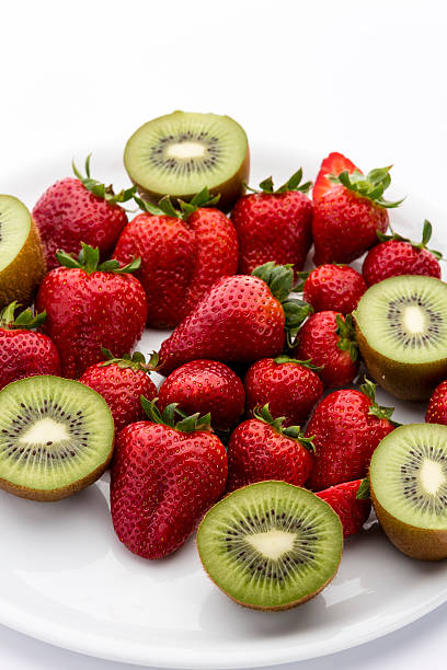 istock Strawberries and halved kiwifruits 506210443
