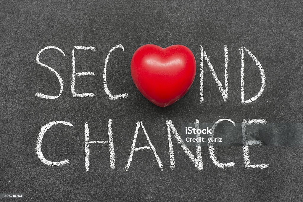 second chance second chance phrase handwritten on blackboard with heart symbol instead of O Opportunity Stock Photo