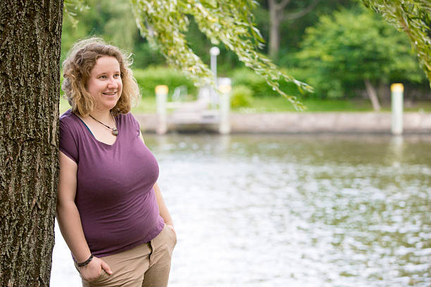 istock young woman in park 506214359