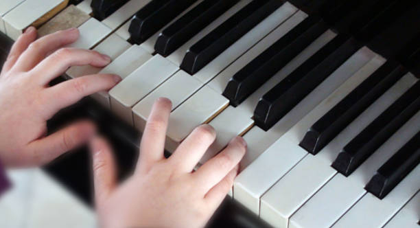 istock Hand Playing Classic Music With Piano Keyboard 506214926