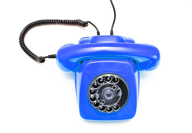 istock Blue retro telephone isolated on white background. 506215072