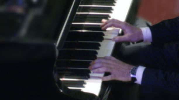 istock Hand Playing Love Songs With Piano Keyboard 506217516