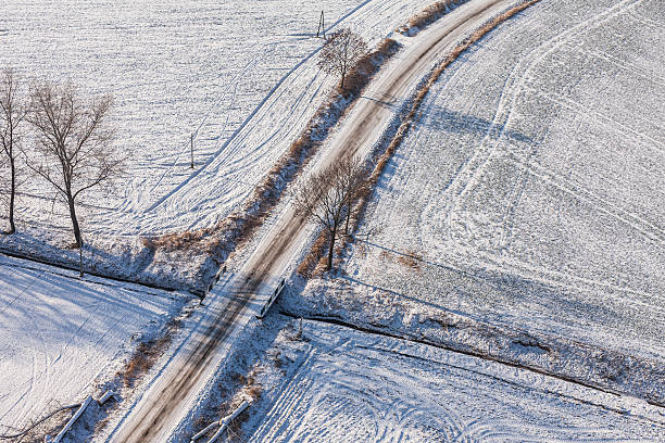 istock aerial view  over the harvest fields in winter 506217964