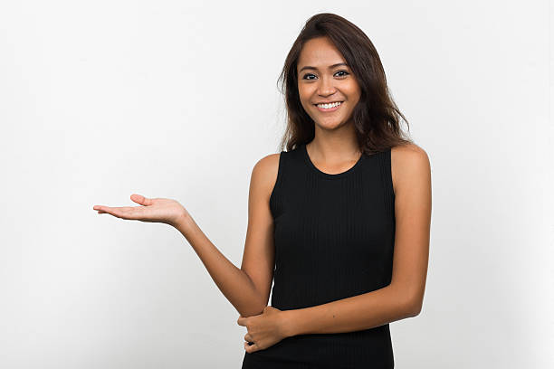 istock Asian woman presenting 506218766