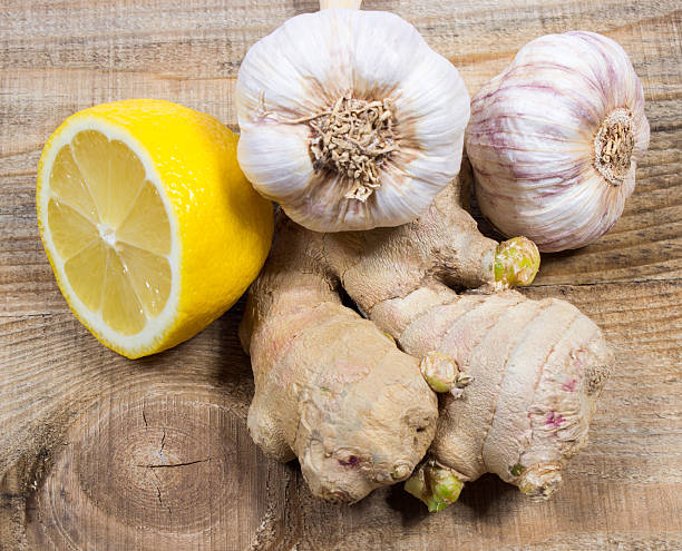 Ginger, lemon, and garlic. Concept for natural medicine. stock photo