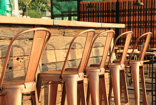 Lined up of metal bar stools