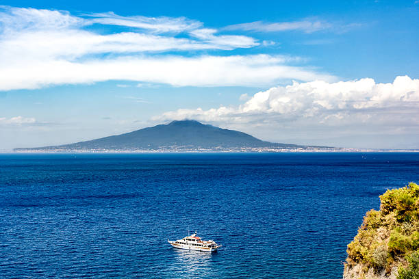 Cruise ship on Amalfi coast in front of Vesuvio volcano