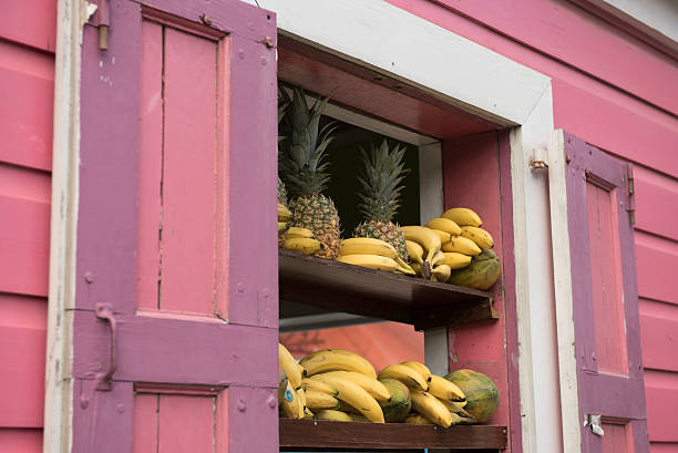 Local produce on sale in a colourful shop front, Tortola, BVI