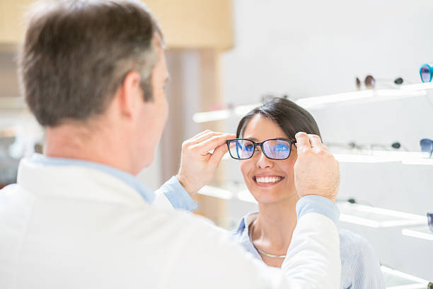 istock Patient trying glasses at the optician 506239258