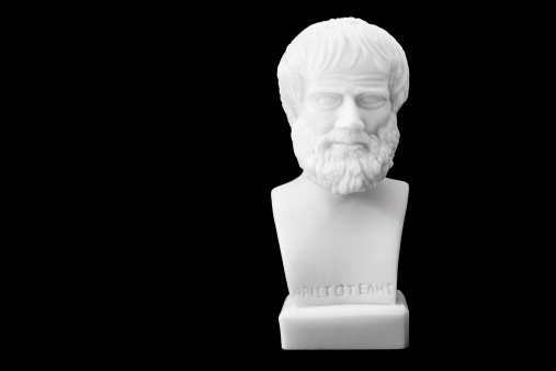 Greek philosopher Aristotle (384-322 B.C.E.) sculpture isolated on black background