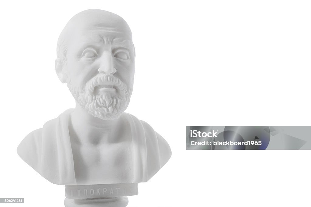 Ancient Greek physician Hippocrates (460-380 B.C.E.) Ancient Greek physician, traditionally regarded as the father of medicine. Sculpture isolated on white background Hippocrates Stock Photo