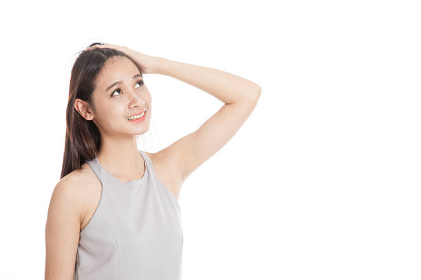 istock Beautiful young Asian woman look up 506242890